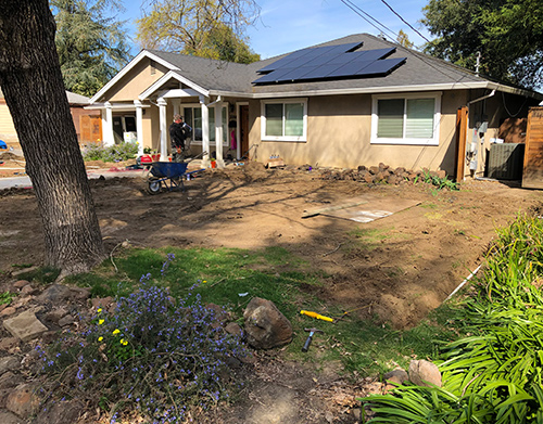 A look at the bare dirt front yard waiting for us