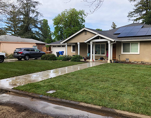 Brand new sod laid out across a huge front yard